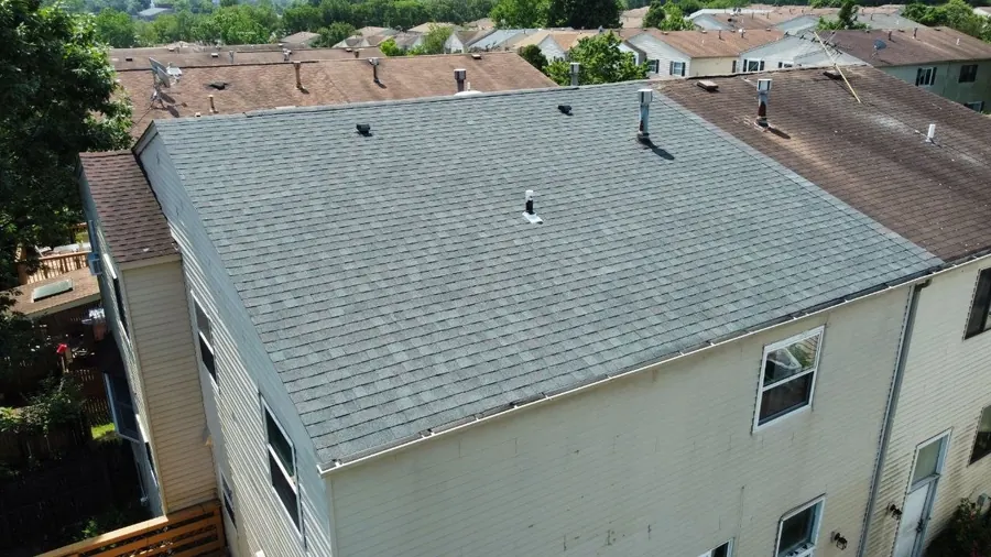 Drone view of a finished townhouse roof